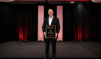 Wayne Wright receiving recognition as an IBBA Chairman's Circle Award recipient for outstanding business brokerage performance in 2025.